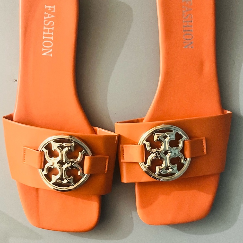 Orange Slide Sandals with Gold Emblem